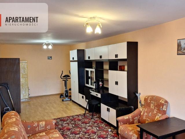 Zapraszam do przestronnego 79 m² mieszkania w kamienicy przy Rynku