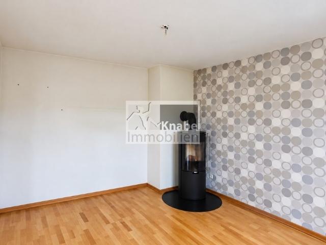 Zentral in Spenge: Wohnkomfort mit Kamin und Südbalkon!