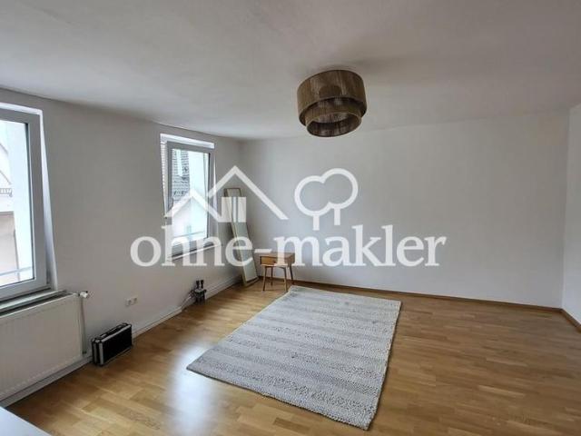 Zentral wohnen mit Weitblick – charmante Dachgeschosswohnung mit Balkon