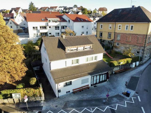 Zentrales Mehrfamilienhaus mit Gewerbeeinheit im Herzen von Obersulm!