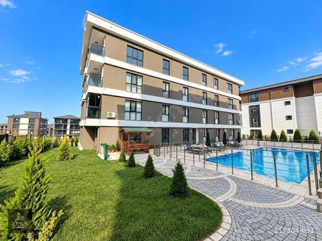 ZENS'DEN HAVUZLU SİTE İÇERİSİNDE BALKONLU GENİŞ M2'Lİ 2+1 DAİRE