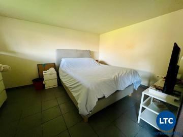 Zeer ruime rijwoning met 3 à 4 slaapkamers, garage, oprit, tuin en terras