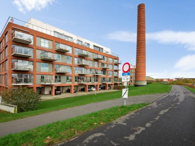 Zeer verzorgd éénslaapkamer APP op 1eV met Z terras & autostaanplaats