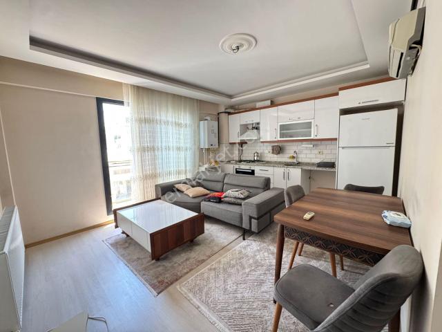 Zeki Emlak'tan Manisa Muradiye Mahallesinde Cadde Üstü Kiralık 1+1 Eşyalı Daire