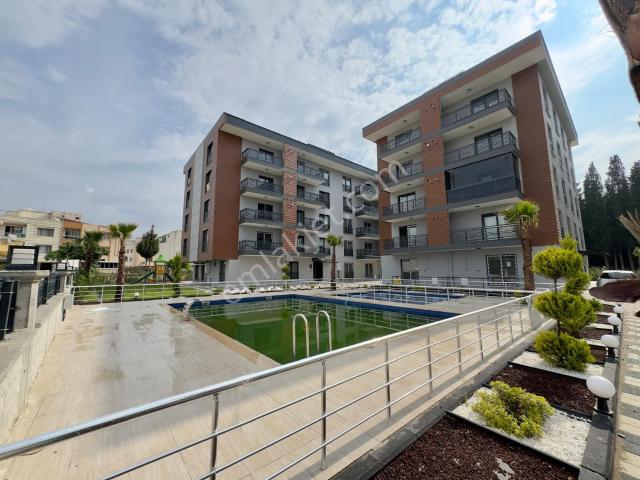 Zeki Emlak'tan Manisa Muradiye Mahallesinde Havuzlu Site İçinde 1+1 Kiralık Daire
