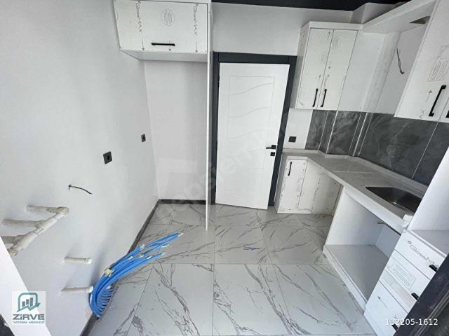 ZİRVE EMLAK'TAN KULLANIŞLI VE UYGUN LUX YAPI SIFIR SATILIK DAİRE