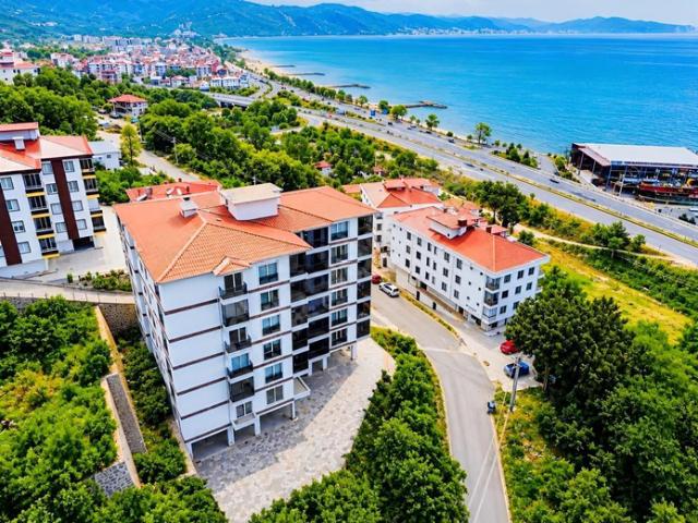ZİRVE EMLAK KUMBAŞI MAH DENIZ MANZARALI %80 BİTMİŞ SATILIK DAİRE