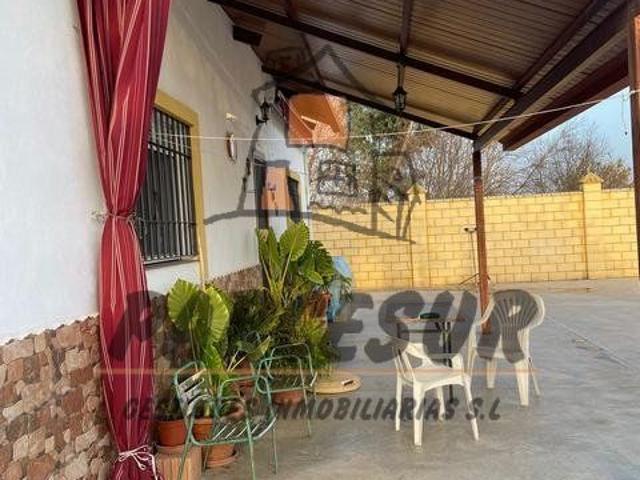 ZONA LAS CUEVAS PARAMO Parcela de 3.000 m2 con casa de 84 m2 con salon con chimenea