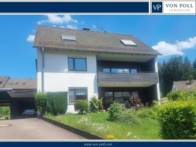 Zweifamilienhaus mit zusätzlicher Wohneinheit in ruhiger Lage