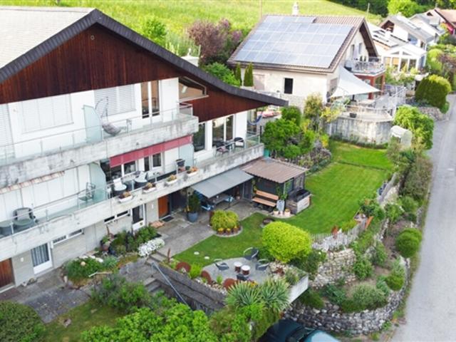 Zweifamilienhaus mit atemberaubender Alpenaussicht und Renditepotenzial
