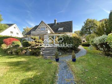 Zweifamilienhaus mit Gartenidylle in Spielstraßenlage