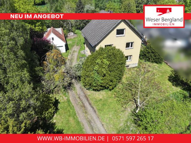 Zweifamilienhaus mit großem Naturgrundstück