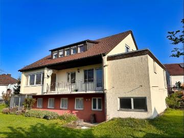 Zweifamilienhaus auf sonnigem Traumgrundstück