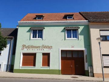 Zweifamilienhaus / Gewerbeobjekt mit Nebengebäude zu verkaufen!