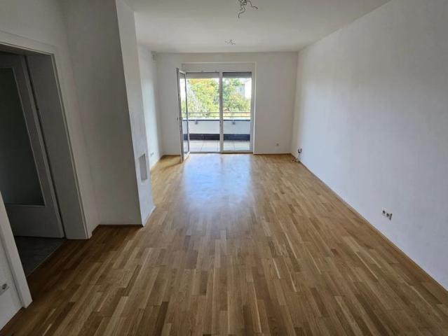 Zu Beginn NUR ca. € 5.000, FB / Geförderte Genossenschaftswohnung im 1. Liftstock mit Loggia & Tiefgaragenparkplatz Top 10