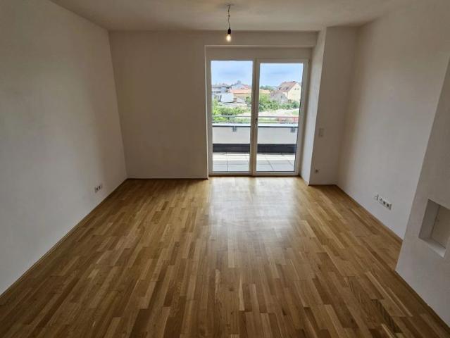 Zu Beginn NUR ca. € 5.000, FB / Geförderte Genossenschaftswohnung im 2. Liftstock mit Loggia & Tiefgaragenparkplatz Top 13