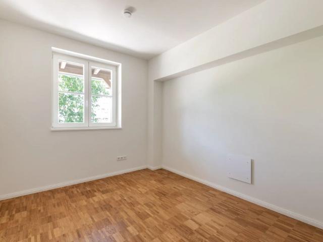 Zum Erstbezug: Sonnige Erdgeschosswohnung mit Südterrasse und Privatgarten