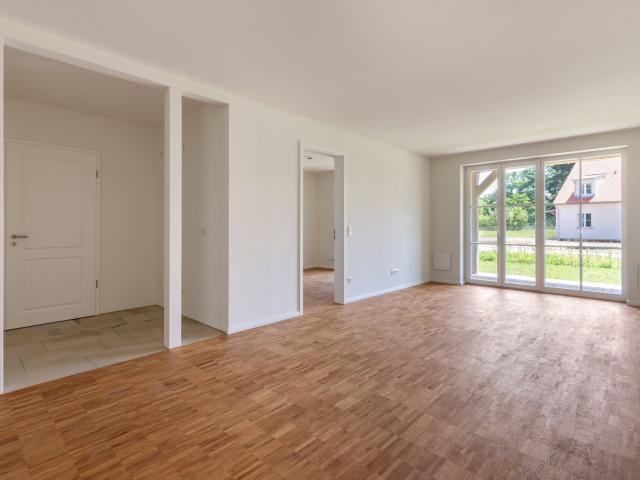 Zum Erstbezug: Sonnige Erdgeschosswohnung mit Südterrasse und Privatgarten