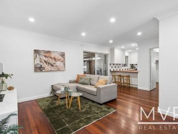 A Much Loved Family Home in a Peaceful Parkside Setting!