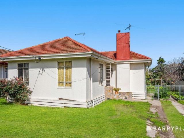 A Much Loved Solid Brick Home with Endless Potential