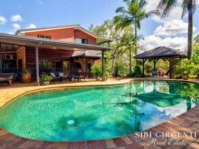 A Masterpiece of Riverfront Luxury and Timeless Elegance