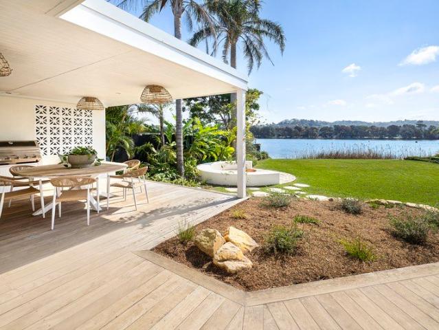 A Mediterranean Inspired Villa Between Lake and Surf