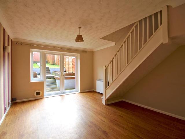 A mid terrace two bedroomed house, with a garage, on a quiet cul de sac close to local amenities. The property benefits from easy access to A14 and transport links, into Cambridge