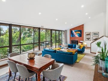 A mid century classic with treetop elevation and coastal outlooks
