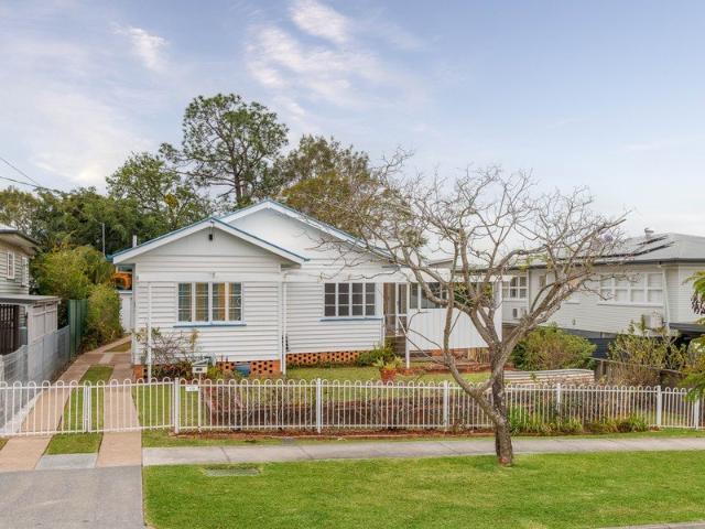 A MID CENTURY GEM WITH CHARACTER AND ROOM TO DREAM