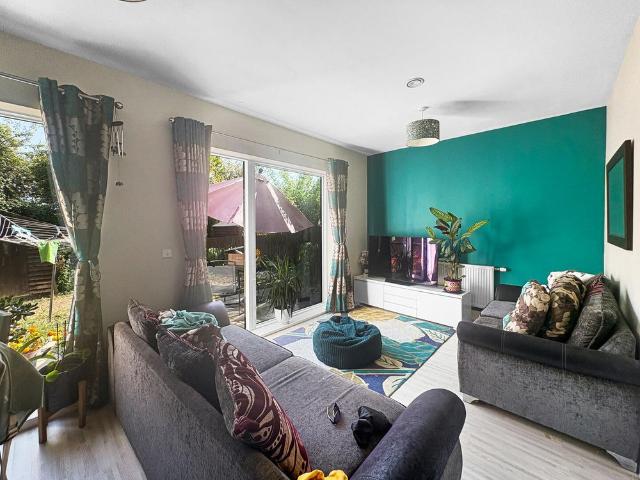 A modern two bedroom home offering well arranged accommodation over two floors, with a private rear garden, useful external storage and a bright, contemporary feel throughout