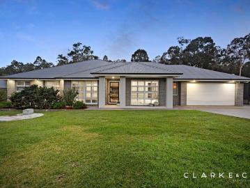 A MODERN ACREAGE RETREAT TO CALL HOME!