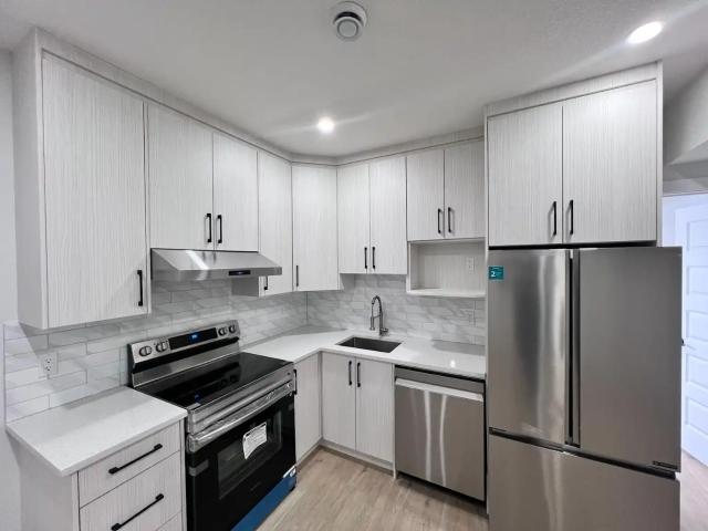 A modern Cozy 1 Bedroom Legal Basement Suite