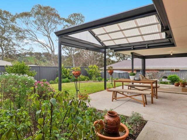 A Modern Design, Magically Upgraded with Gardens to Thrive in!