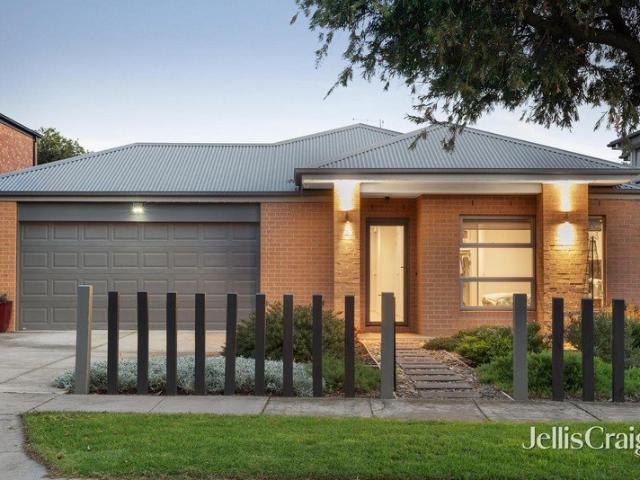 A modern marvel of single level parkside living
