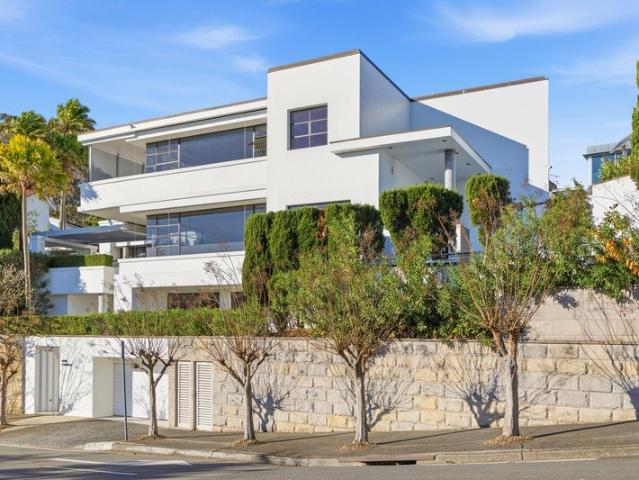 A modern masterpiece set against a backdrop of dazzling harbour views