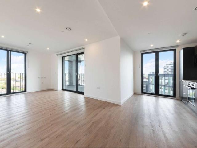 A modern one bedroom apartment at Plaistow Hub, offering bright open plan living, a fully equipped kitchen and a private balcony with East London views