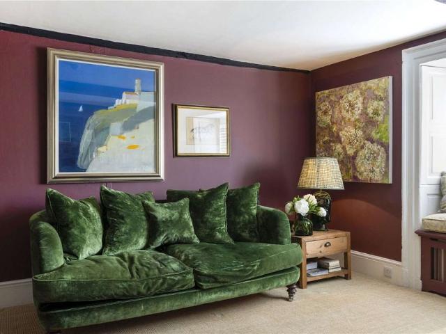 A most attractive Grade II Listed village house with exceptional interiors and beautifully landscaped gardens and grounds