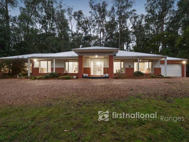 A Near New Masterpiece in a Peaceful Hills Setting