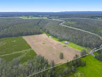 Rare Coastal Acreage with Scale, Creek Frontage & Real Future Upside