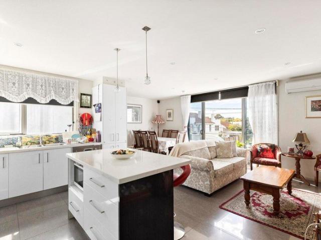 A one bedroom that thinks bigger, with views to match