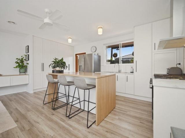 A ONE OF A KIND RENOVATION WITH STYLE, FUNCTION & UNMATCHED CONVENIENCE!