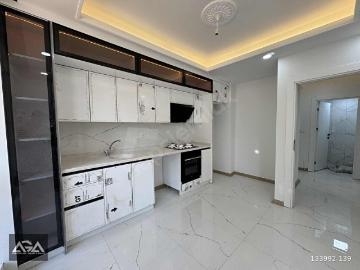 AĞAOĞULLARINDANÇARŞI MERKEZ'de 2+1 E.BANYO KİLER LÜX DAİRE