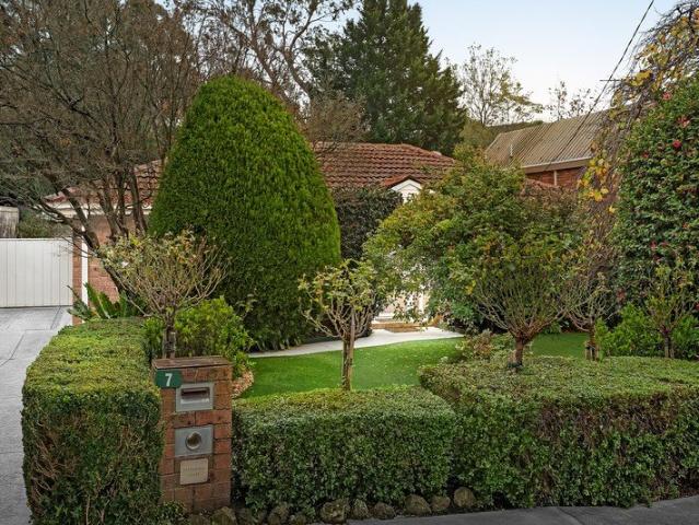 A Beautifully Maintained Home in a Peaceful Garden Setting