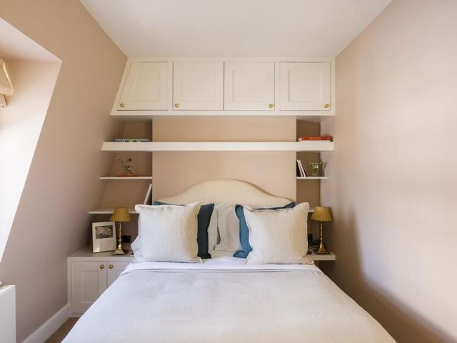 A beautifully curated, best in class, four storey Kensington townhouse with private terrace and exceptional entertaining space on a charming residential street