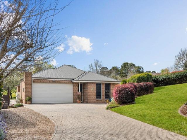 A Beautifully Landscaped Retreat with Views to Match