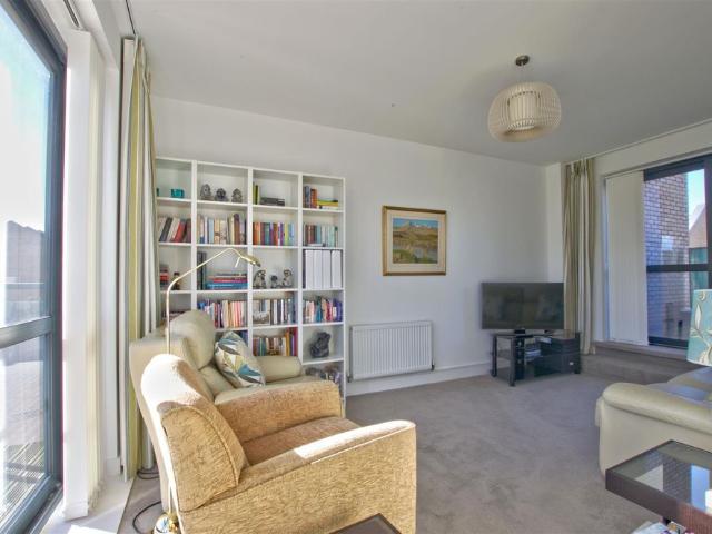 A beautifully presented, four bedroom townhouse of over 1200 sqft / 120 sqm. The property enjoys a pleasant position overlooking an attractive green and has a landscaped rear garden
