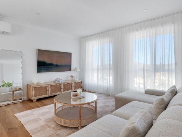 A beautifully presented freestanding townhome overlooking a peaceful reserve