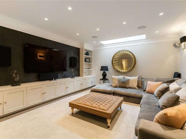A beautifully refurbished five bedroom house in a sought after street
