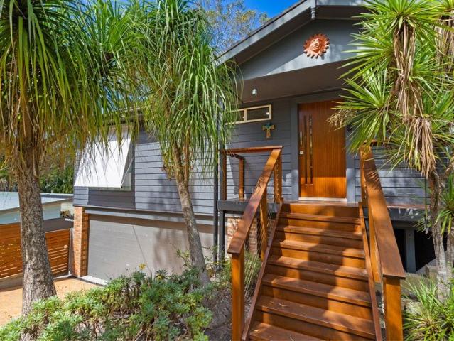 A beautifully reimagined family retreat only a short walk to Elizabeth Beach and Wallis Lake
