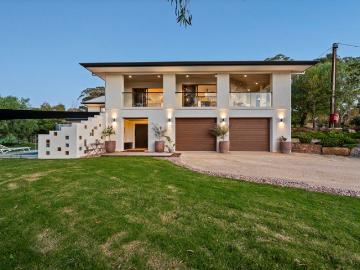 A Bespoke Hillside Masterpiece with Panoramic Views